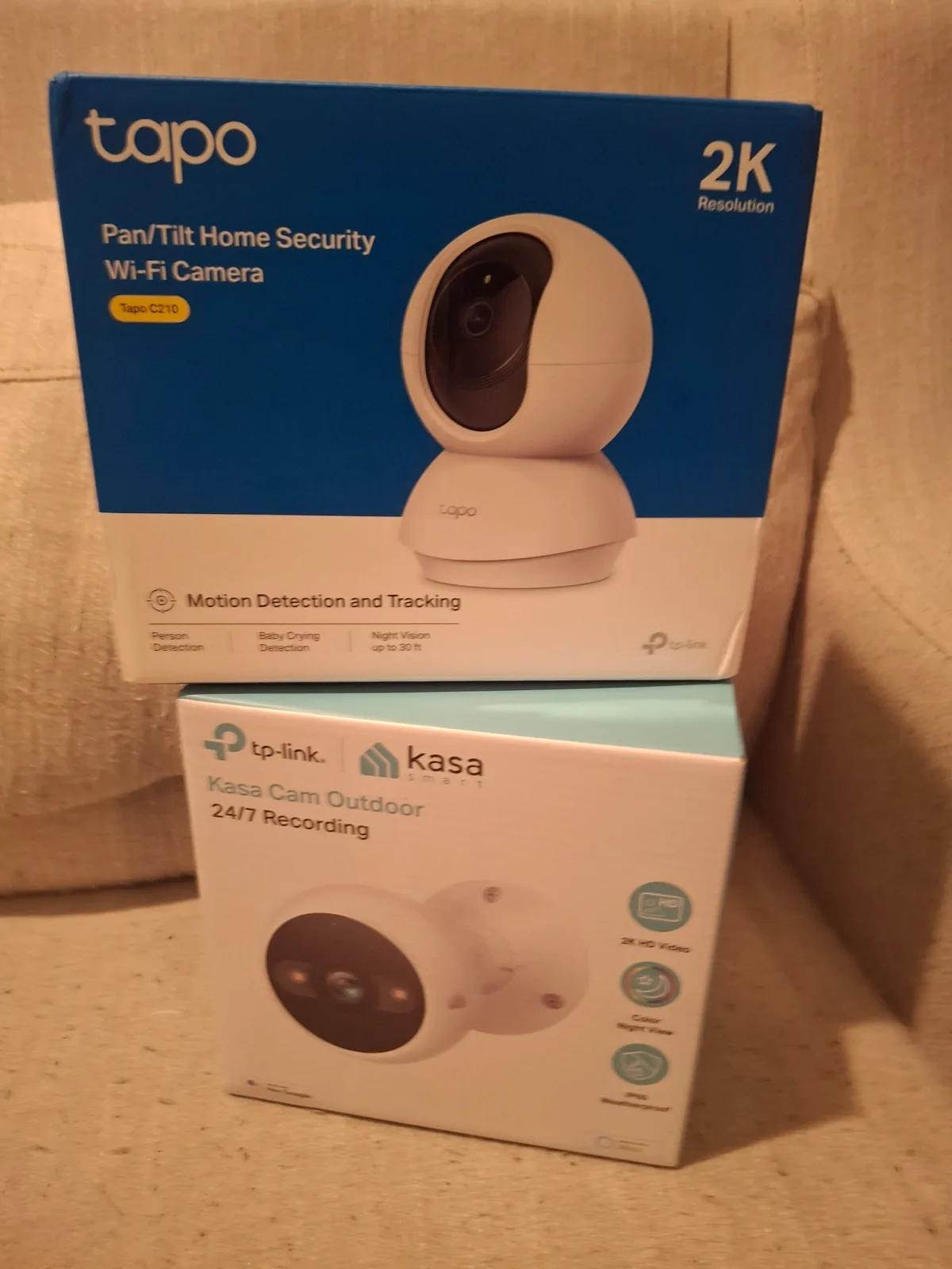 The Tapo and Kasa cameras side by side